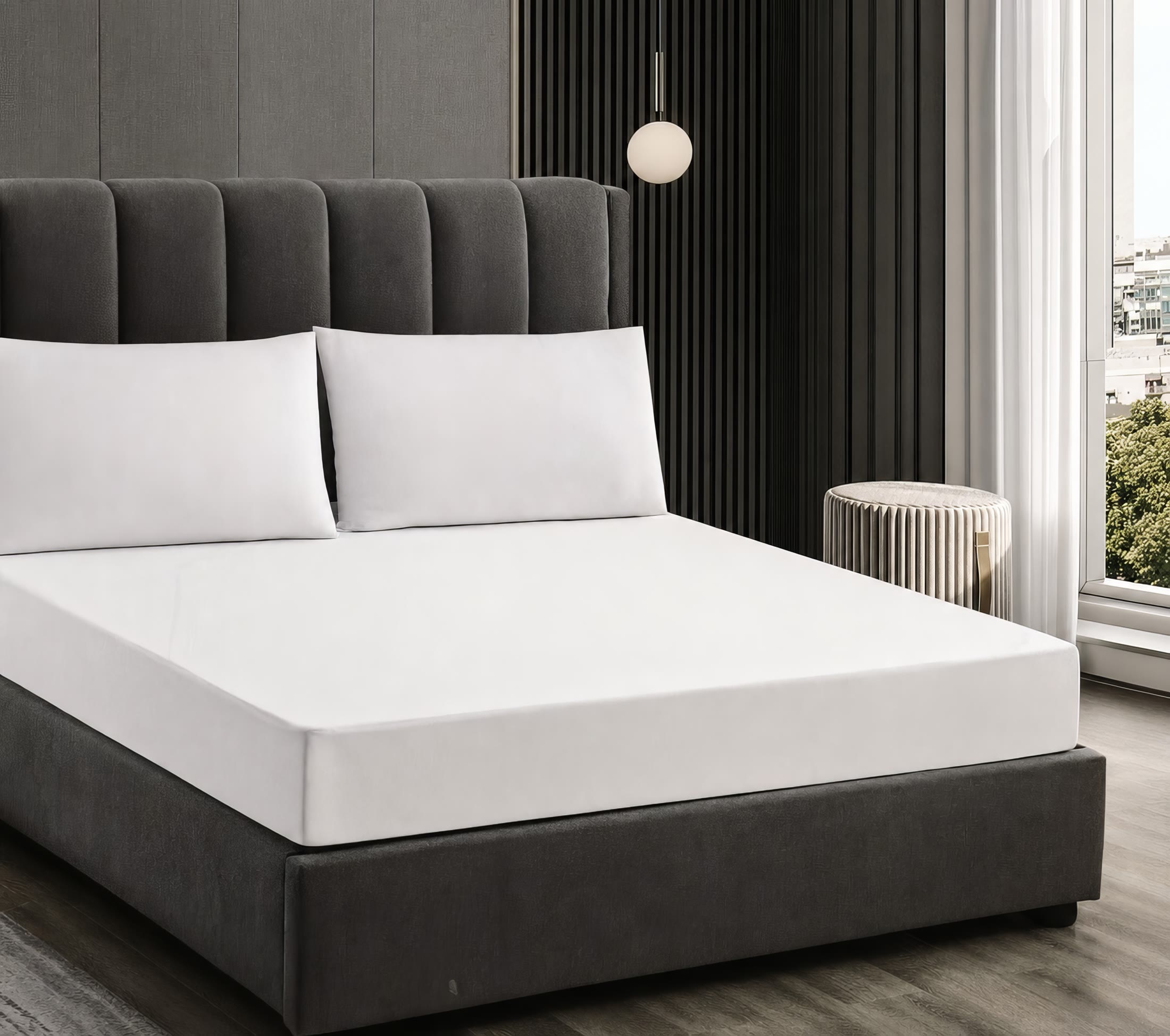 A white mattress protector in a modern bedroom