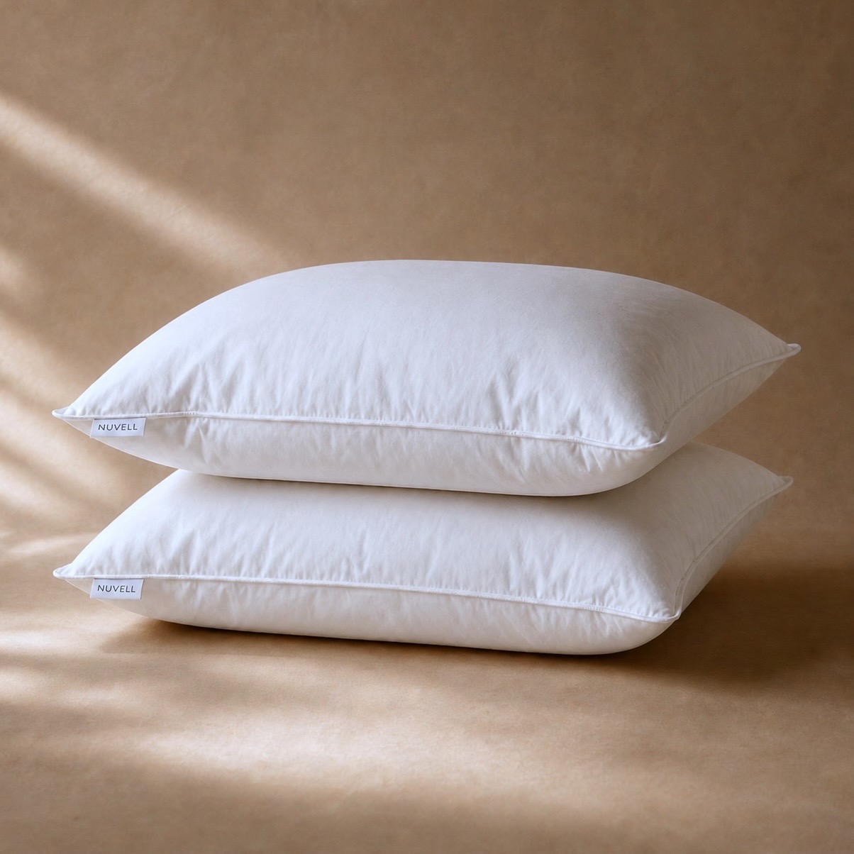 NUVELL Pillow on a warm neutral surface